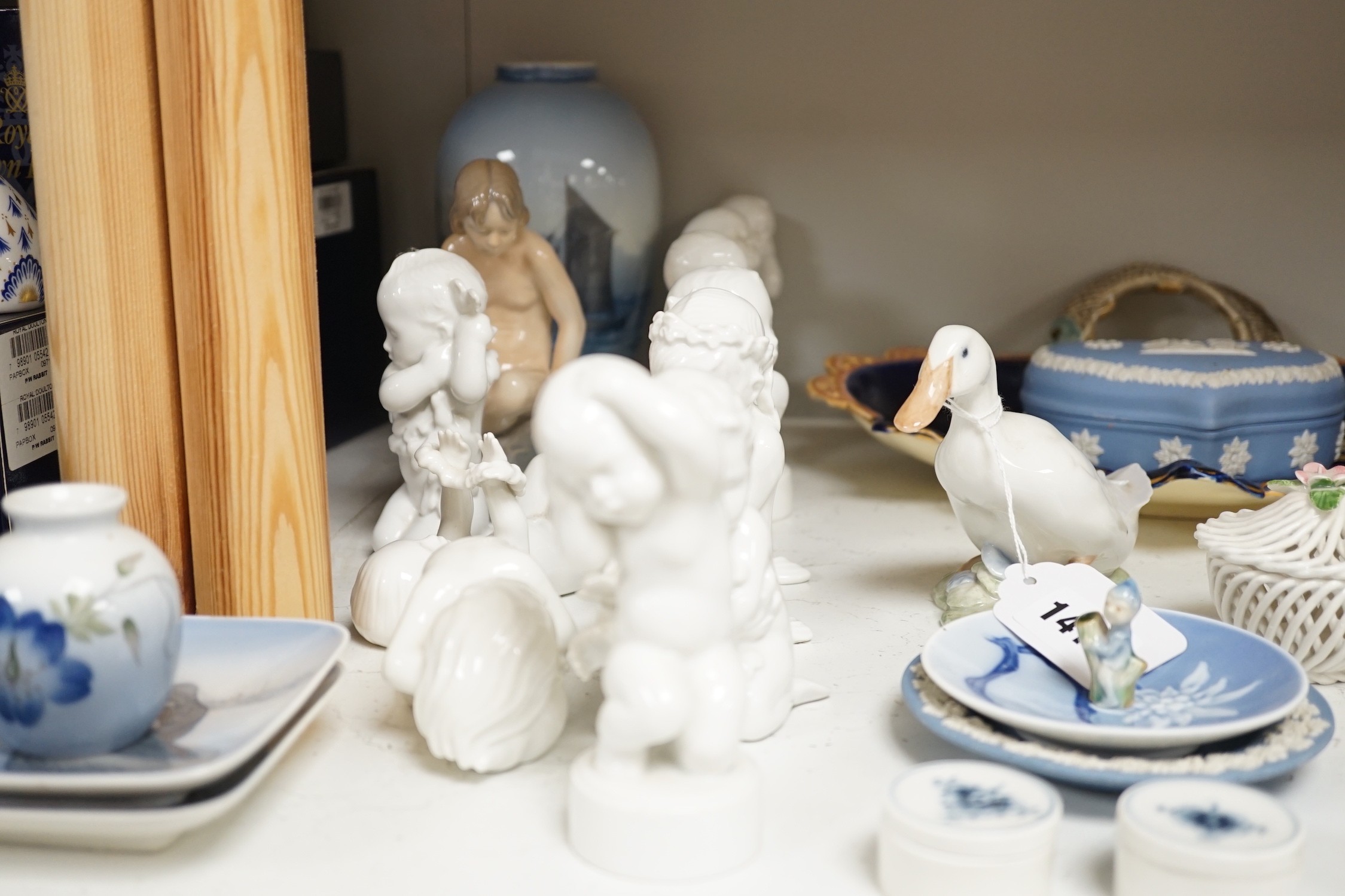 A Royal Copenhagen vase, various dishes and four ornaments, ten Bing & Grondahl figures, two Wedgwood jasperware pots and other ceramics, tallest 18cm